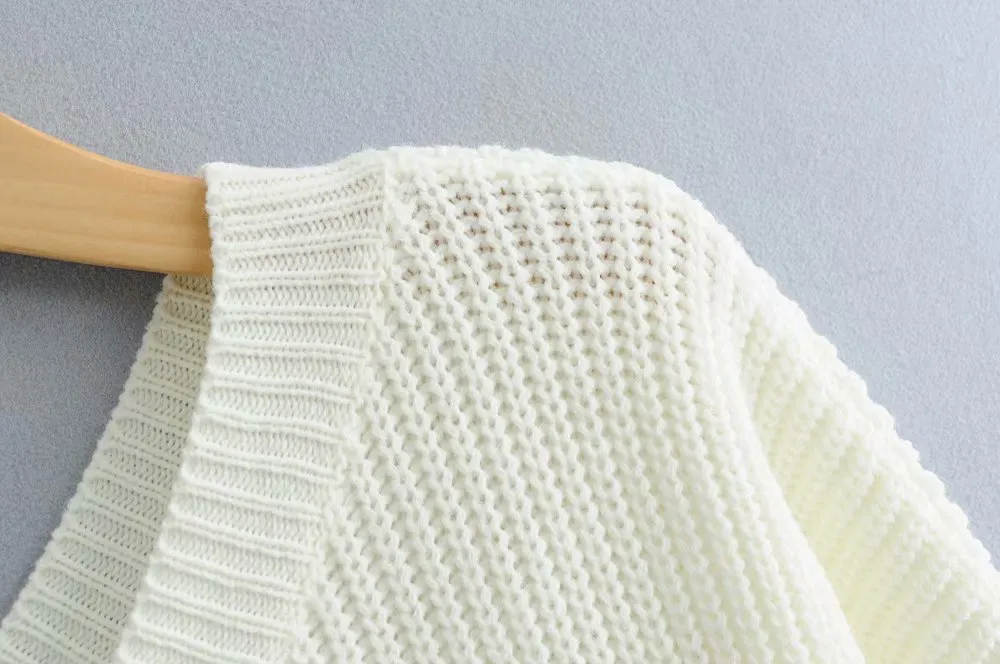ASYMMETRIC SWEATER