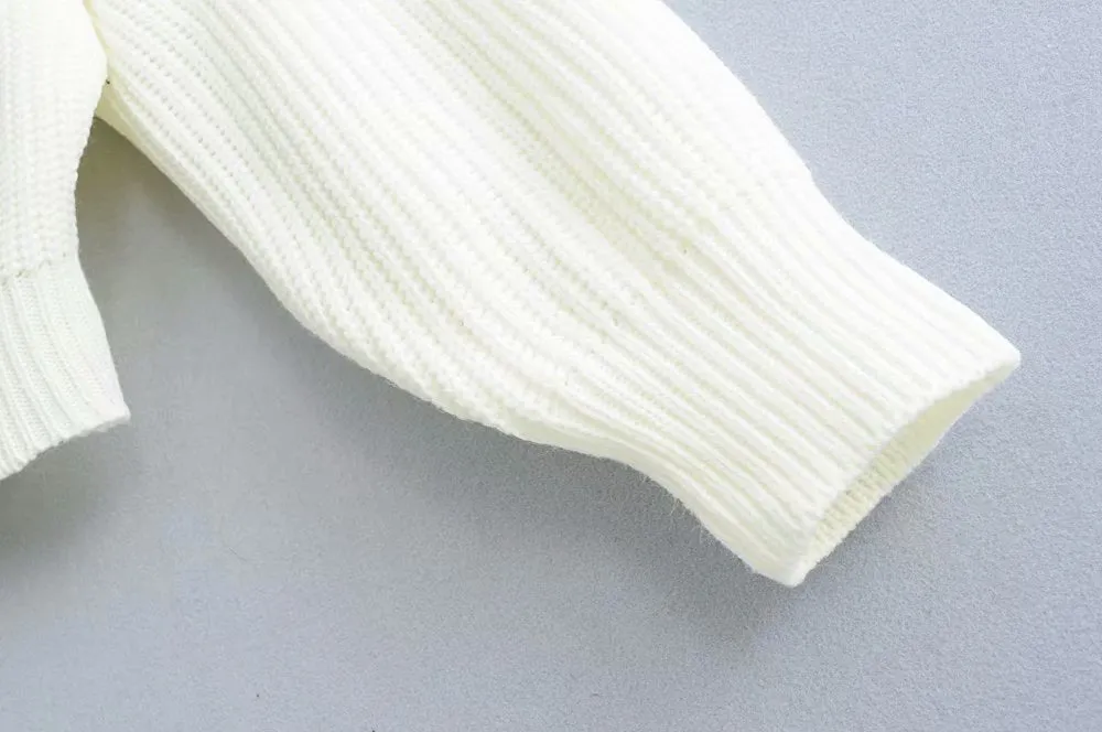 ASYMMETRIC SWEATER